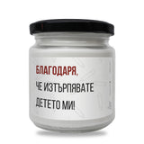 a jar of white paint with a black lid