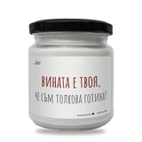 a white jar with a black lid on a white background