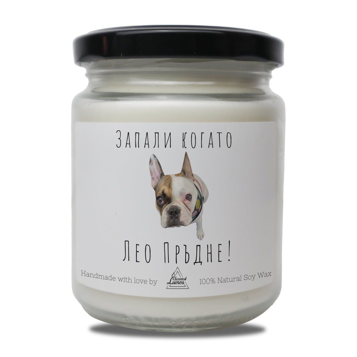 a jar of white candle with a dog on it