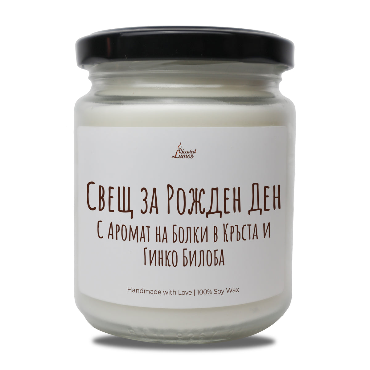 a jar of white candle sitting on top of a table