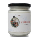 a candle with a picture of a man and a woman on it