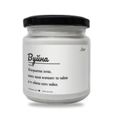 a jar of white paint on a white background