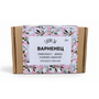 a cardboard box with a floral pattern and text in Russian.