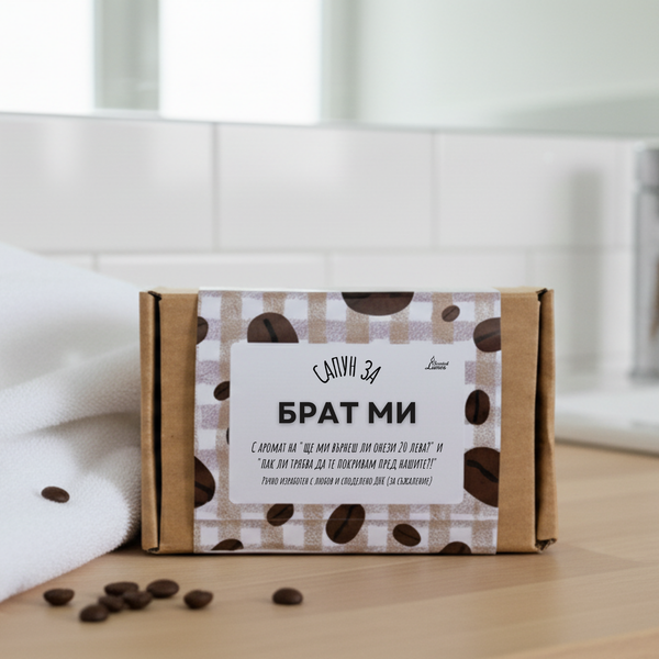 A cardboard box with a label that reads "ТАЛАНИКА ВОЛАНИКА" and "РУБЛЬ ГОЛЕНИКА" printed on it, along with some text in Cyrillic script. The box is placed on a wooden surface, and there are coffee beans scattered around it.