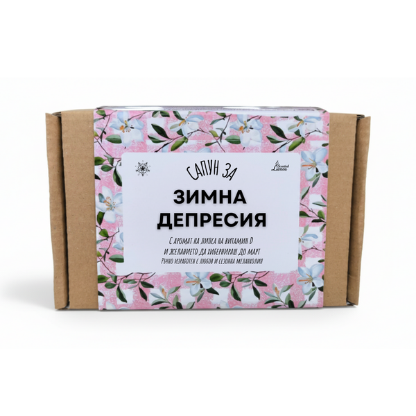 a cardboard box with a floral pattern and text in Russian.
