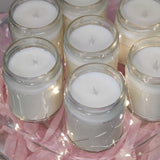 a close up of many small candles on a table