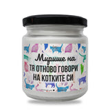 a white jar with cats on it