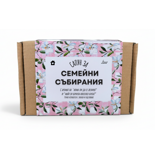a cardboard box with a floral pattern and text in Cyrillic script.