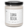 a jar of libra bitch candle on a white background