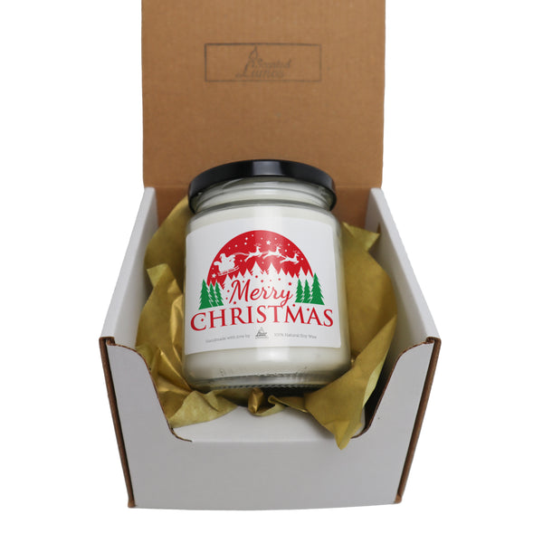 a christmas candle in a gift box