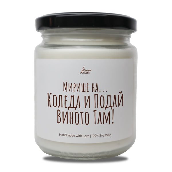 a jar of white candle with a black lid