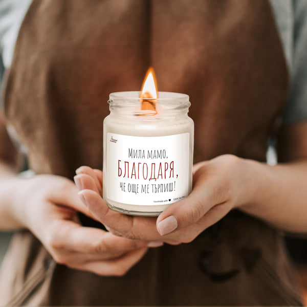 a woman holding a candle in her hands