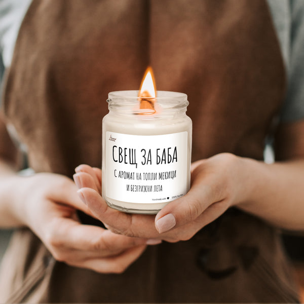 a woman holding a candle in her hands