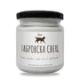 a jar with a dog on it sitting on a white surface