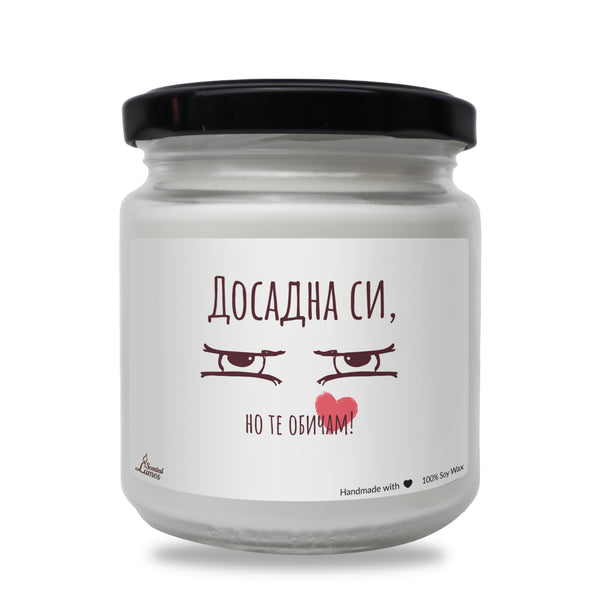 a white jar with a red heart on it