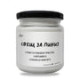 a jar of white paint on a white background
