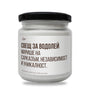 a white jar with a black lid on a white background