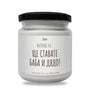 a white jar with a black lid on a white background
